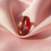 Red Acrylic Ring with Gold Clover Design