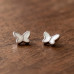 Shimmering Paw Crystal Studs